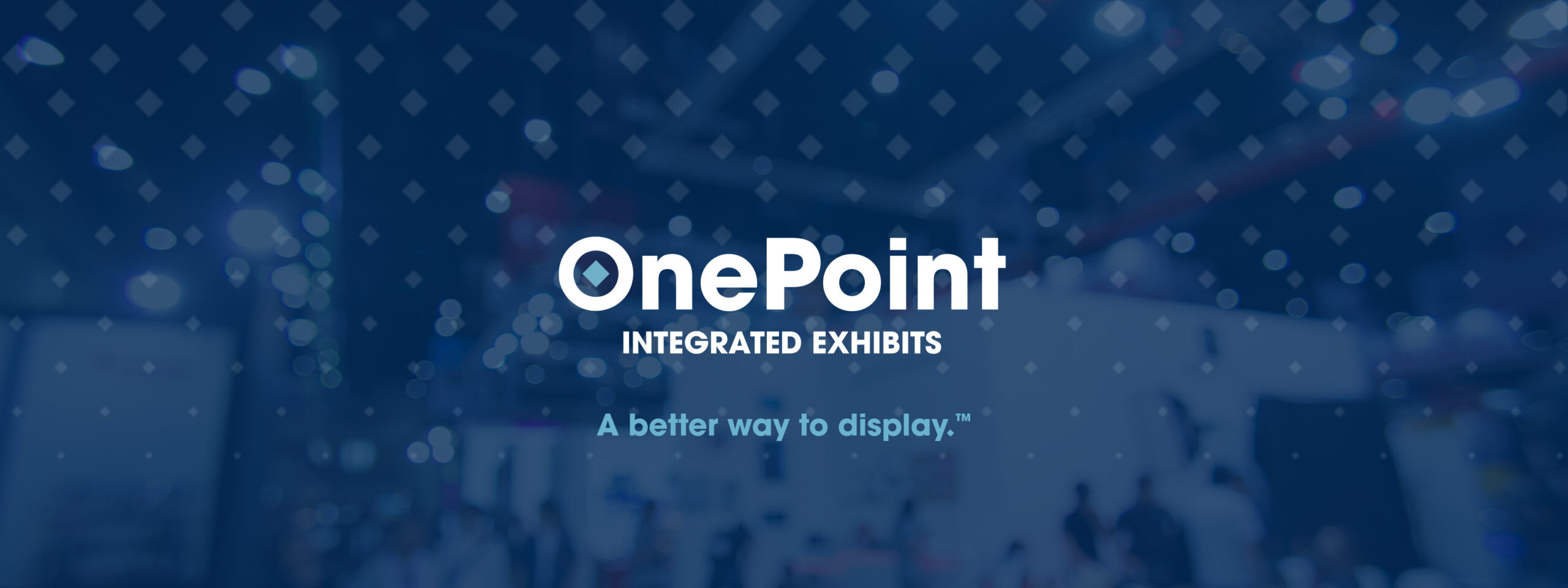 OnePoint logo over a blurry blue background
